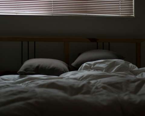 empty white and gray bed set